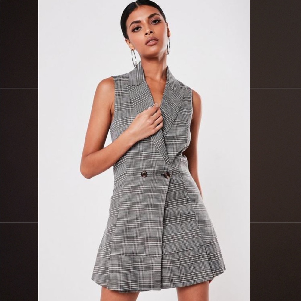 Blazer dress in brown plaid.